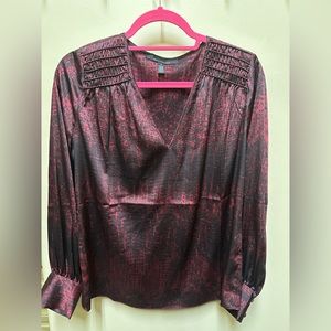 WHBM Smocked Shoulder Satin Blouse. Size small. Color is Black and a Brick Red